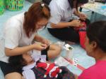 โครงการเฝ้าระวังและส่งเสริมทันตะสุขภาพในศูนย์พัฒนาเด็กเล็กใน